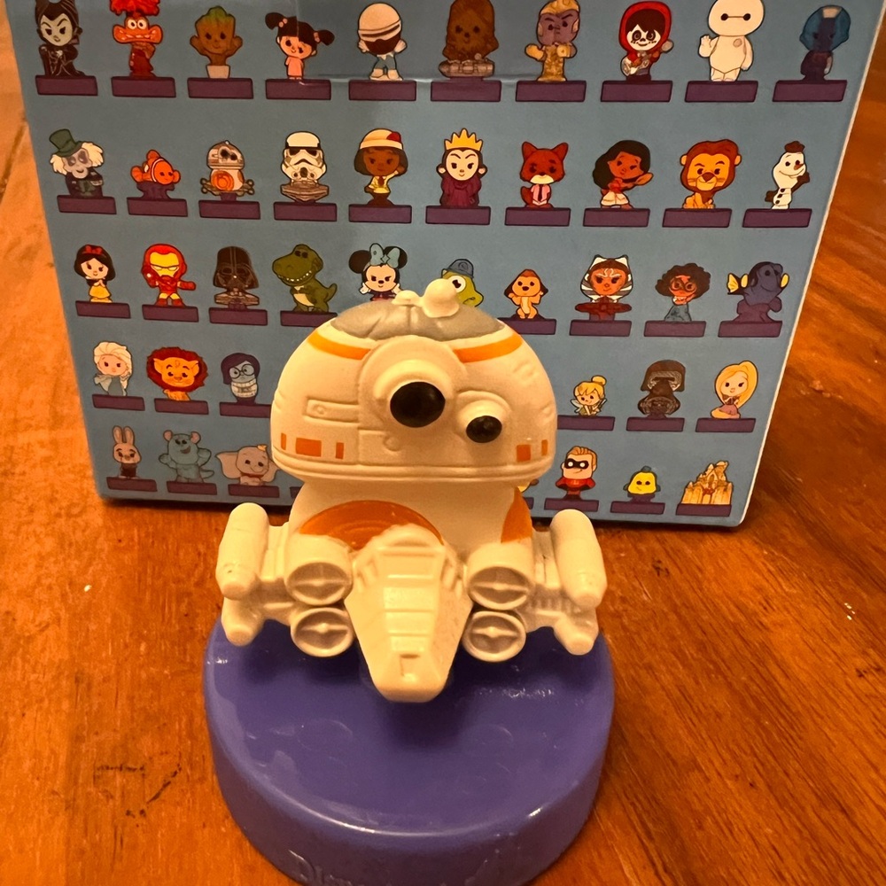 Disney Orange and White Robot Figure